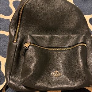 Coach black women’s backpack.